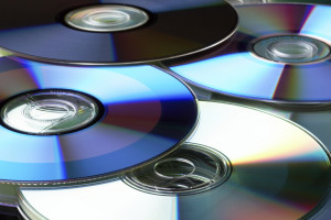 Many colorful DVD lying upon each other - landscape format