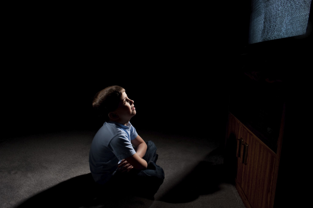 boy in front of tv