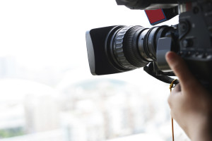 close up of television operator with camera.