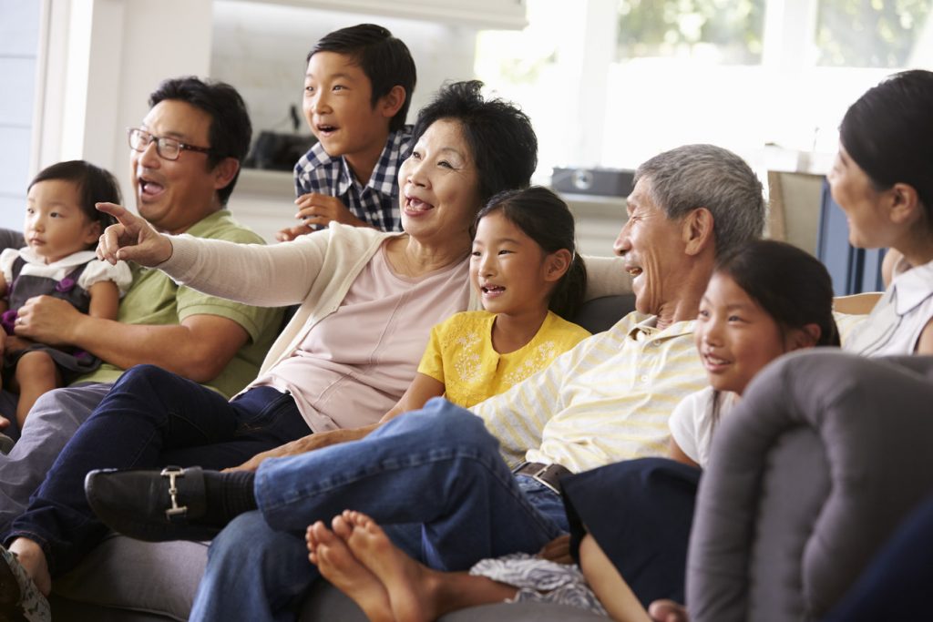 Family Watching Home Movies Together